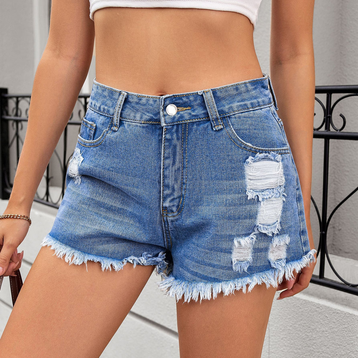 Women's ripped denim shorts and hot pants